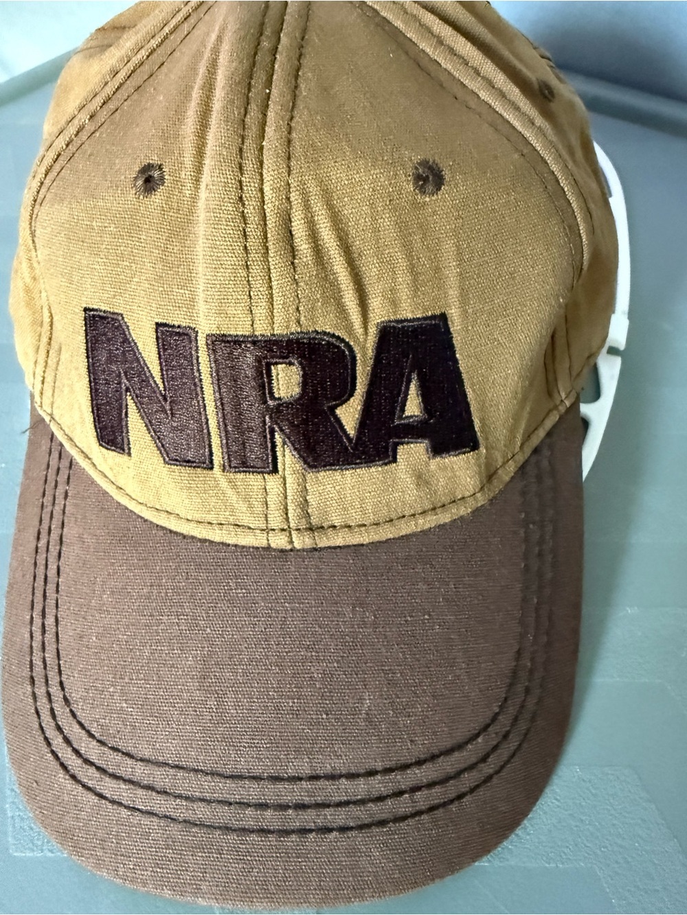 NRA Embroidered Two-Tone Cap - Brown & Tan USA Flag Adjustable Strap EST 1871